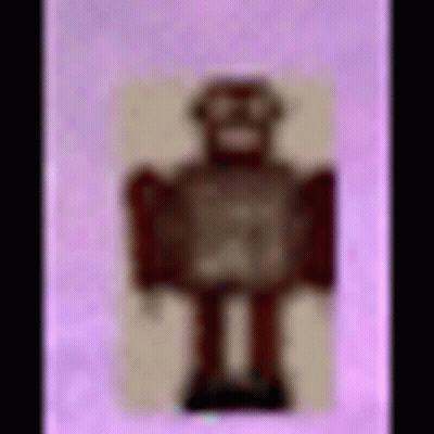 Toy Robot On Pink Background GIF