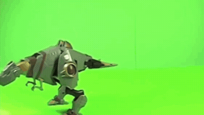 Toy Robot Walking On Green Screen GIF