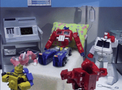Toy Robots In Hospital Room GIF