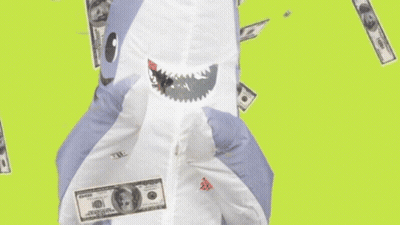 Toy Shark Surrounded By Falling Money GIF