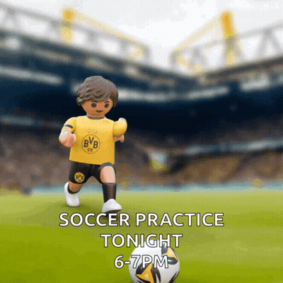 Toy Soccer Player In Yellow BVB Jersey Kicking Ball GIF