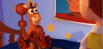 Toy Story Character Beside Stuffed Animal Dany GIF