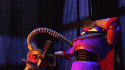 Toy Story Character Holding Large Gun GIF