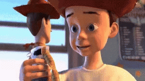 Toy Story Character Holding Woody Doll