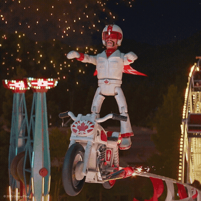 Toy With Canadian Flag On Motorcycle GIF