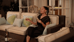 Tracee Ellis Ross Drinking Wine Feeling Hot GIF