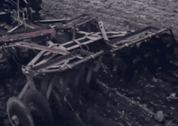 Tractor Plowing The Field GIF
