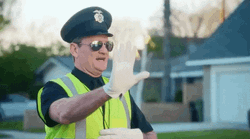 Traffic Cop Brett Eldredge Directing Traffic GIF