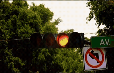 Traffic Light With Green Sign Saying Av GIF