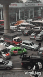 Traffic Under A Bridge Overpass GIF