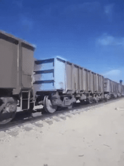 Train On Tracks With Blue Box GIF