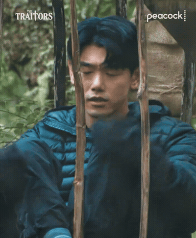 Traitors Ad Man Laying In Woods GIF