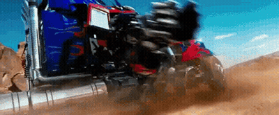 Transformer Driving Down Dirt Road With Motorcycle GIF