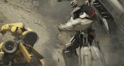 Transformer Fighting Another Transformer On Hill GIF