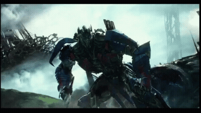 Transformer Flying Through City GIF