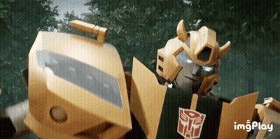 Transformer Robot With Blue Eyes Holding Shield GIF