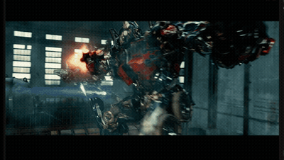 Transformer With Gun Fighting Robot GIF