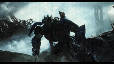 Transformer With Sword Standing In Field GIF