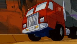 Transformers Cartoon Optimus Shooting GIF