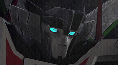 Transformers Head Closeup With Blue Eyes GIF