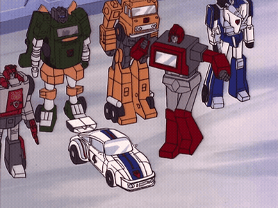 Transformers Standing Around White Car Number 4 GIF