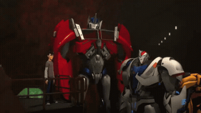 Transformers Standing In Dark Room GIF
