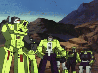 Transformers Standing Together With Letter C GIF