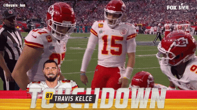 Travis Kelce Standing On Football Field GIF