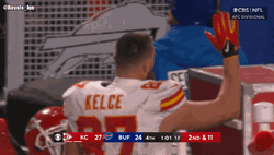 Travis Kelce Waving Hands Blowing Kiss GIF