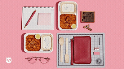 Tray Of Food Beside Notebook And Pen GIF