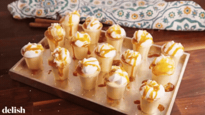 Tray Of Ice Cream Cones With Delish GIF