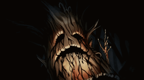 Tree With Face In Dark GIF