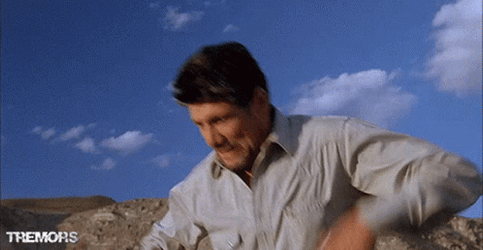 Tremors Earl Basset Valentine McKee Backing Out GIF