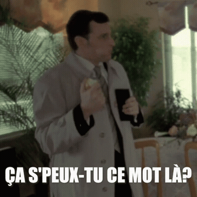 Trench Coat Man Holding Apple Says Ca S'peux-Tu Ce Mot La GIF