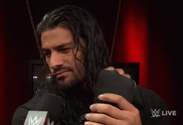 Tribal Chief Roman Reign Wearing Gloves GIF