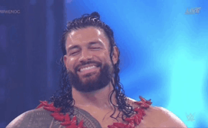 Tribal Chief Roman Reigns Smiling While Closing Eyes GIF