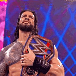 Tribal Chief Roman Reigns Sweeping Hair Back GIF