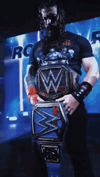 Tribal Chief Roman Reigns Wins Wwe Holding Belt GIF