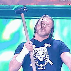 Triple H Wielding A Sledge Hammer GIF