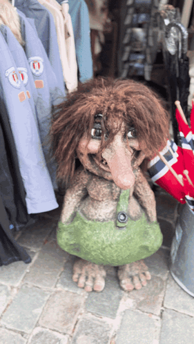 Troll Statue With Green Skirt GIF