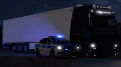 Truck Beside Police Car With Blue Lights GIF
