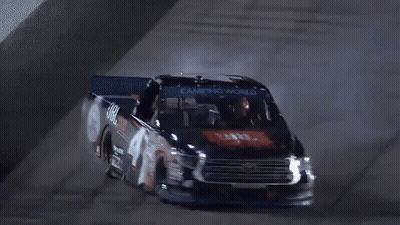 Truck Drifting On Track With Tire Smoke GIF