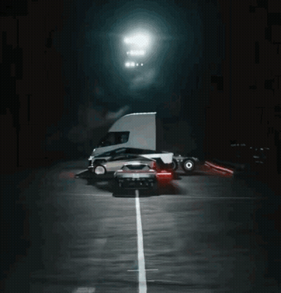 Truck Driving Down Road With Car On Back GIF
