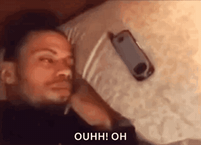Trucks Driving Down Highway With La Riviera Sign GIF