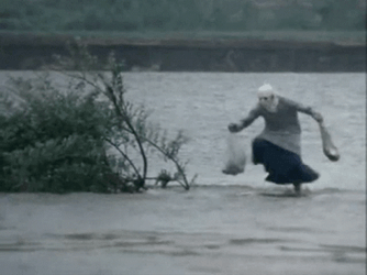 Trying To Survive From Flooding GIF