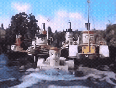 Tug Boats Floating On A River GIF