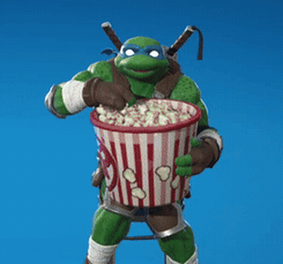 Turtle Holding Striped Bucket Of Popcorn GIF