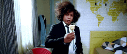Tuxedo Offering Flower GIF
