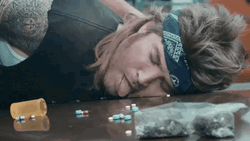 Tweaker Bill Ray Licks Medicine On Floor GIF
