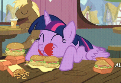 Twilight Sparkle From My Little Pony Is Laying On A Table Eating A Hamburger GIF